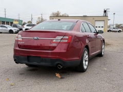 Used 2013  Ford Taurus 4d Sedan SEL V6 at Paradise Motors near Lansing, MI