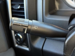 Used 2014  Ram 1500 4WD Quad Cab SLT at Paradise Motors near Lansing, MI