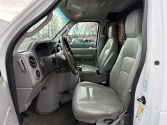 Used 2010  Ford Econoline Cargo Van E150 Van at Paradise Motors near Lansing, MI