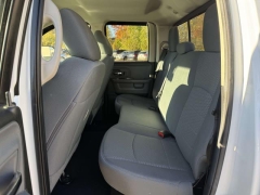 Used 2014  Ram 1500 4WD Quad Cab SLT at Paradise Motors near Lansing, MI