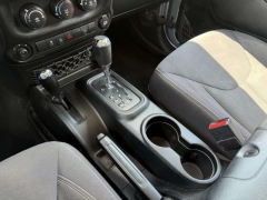 Used 2013 Jeep Wrangler Unlimited 4d Convertible Sahara at Paradise Motors near Lansing, MI