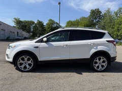 Used 2017  Ford Escape 4d SUV 4WD Titanium at Paradise Motors near Lansing&comma; MI