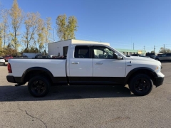 Used 2014  Ram 1500 4WD Quad Cab SLT at Paradise Motors near Lansing, MI