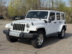 Used 2015  Jeep Wrangler Unlimited 4d Convertible Sahara at Paradise Motors near Lansing&comma; MI