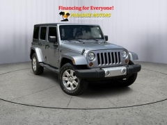 Used 2013 Jeep Wrangler Unlimited 4d Convertible Sahara at Paradise Motors near Lansing, MI