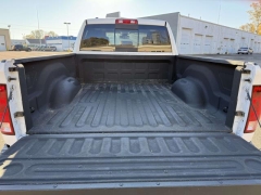 Used 2014  Ram 1500 4WD Quad Cab SLT at Paradise Motors near Lansing, MI