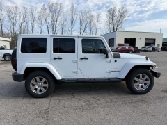 Used 2015  Jeep Wrangler Unlimited 4d Convertible Sahara at Paradise Motors near Lansing&comma; MI