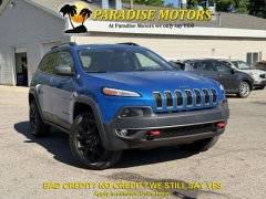  2017 Jeep Cherokee 4d SUV 4WD Trailhawk V6 at Paradise Motors near Lansing&comma; MI