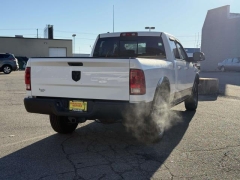 Used 2014  Ram 1500 4WD Quad Cab SLT at Paradise Motors near Lansing, MI