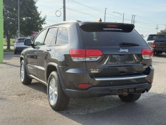 Used 2015  Jeep Grand Cherokee 4d SUV 4WD Limited at Paradise Motors near Lansing&comma; MI