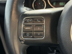 Used 2015  Jeep Wrangler Unlimited 4d Convertible Sahara at Paradise Motors near Lansing&comma; MI