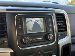 Used 2014  Ram 1500 4WD Quad Cab SLT at Paradise Motors near Lansing, MI