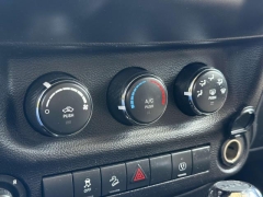 Used 2013 Jeep Wrangler Unlimited 4d Convertible Sahara at Paradise Motors near Lansing, MI