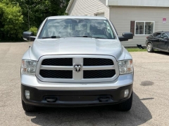 Used 2016  Ram 1500 4WD Quad Cab SLT at Paradise Motors near Lansing, MI
