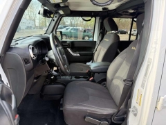 Used 2015  Jeep Wrangler Unlimited 4d Convertible Sahara at Paradise Motors near Lansing&comma; MI