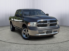 Used 2017  Ram 1500 4WD Quad Cab SLT at Paradise Motors near Lansing&comma; MI