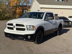 Used 2014  Ram 1500 4WD Quad Cab SLT at Paradise Motors near Lansing, MI