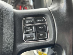 Used 2016  Ram 1500 4WD Quad Cab SLT at Paradise Motors near Lansing, MI