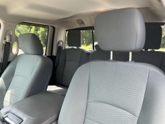 Used 2016  Ram 1500 4WD Quad Cab SLT at Paradise Motors near Lansing, MI