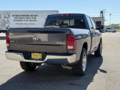 Used 2017  Ram 1500 4WD Quad Cab SLT at Paradise Motors near Lansing&comma; MI