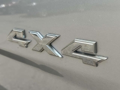 Used 2016  Ram 1500 4WD Quad Cab SLT at Paradise Motors near Lansing, MI