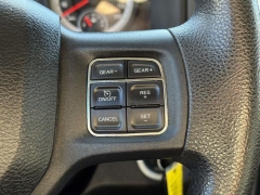 Used 2014  Ram 1500 4WD Quad Cab SLT at Paradise Motors near Lansing, MI