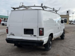 Used 2010  Ford Econoline Cargo Van E150 Van at Paradise Motors near Lansing, MI