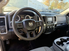 Used 2014  Ram 1500 4WD Quad Cab SLT at Paradise Motors near Lansing, MI