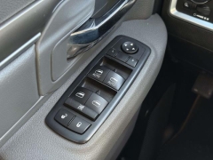 Used 2017  Ram 1500 4WD Quad Cab SLT at Paradise Motors near Lansing&comma; MI