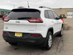 Used 2017  Jeep Cherokee 4d SUV 4WD Sport I4 Altitude at Paradise Motors near Lansing&comma; MI
