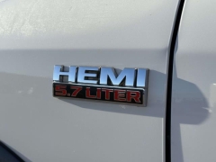 Used 2014  Ram 1500 4WD Quad Cab SLT at Paradise Motors near Lansing, MI