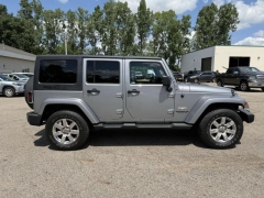 Used 2013 Jeep Wrangler Unlimited 4d Convertible Sahara at Paradise Motors near Lansing, MI