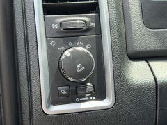 Used 2016  Ram 1500 4WD Quad Cab SLT at Paradise Motors near Lansing, MI