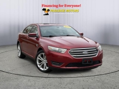 Used 2013  Ford Taurus 4d Sedan SEL V6 at Paradise Motors near Lansing, MI