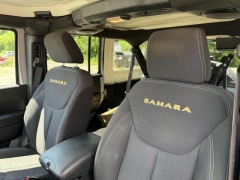 Used 2013 Jeep Wrangler Unlimited 4d Convertible Sahara at Paradise Motors near Lansing, MI