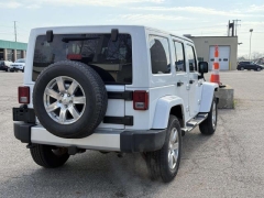 Used 2015  Jeep Wrangler Unlimited 4d Convertible Sahara at Paradise Motors near Lansing&comma; MI