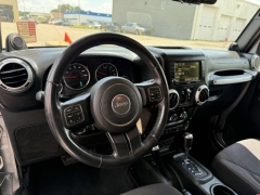 Used 2013 Jeep Wrangler Unlimited 4d Convertible Sahara at Paradise Motors near Lansing, MI