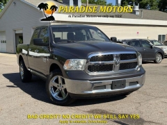  2017 Ram 1500 4WD Quad Cab SLT at Paradise Motors near Lansing&comma; MI