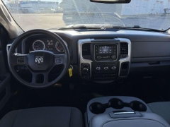 Used 2014  Ram 1500 4WD Quad Cab SLT at Paradise Motors near Lansing, MI