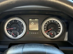 Used 2014  Ram 1500 4WD Quad Cab SLT at Paradise Motors near Lansing, MI