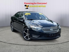Used 2014 Ford Taurus 4d Sedan SEL V6 at Paradise Motors near Lansing, MI