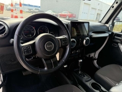 Used 2015  Jeep Wrangler Unlimited 4d Convertible Sahara at Paradise Motors near Lansing&comma; MI