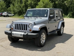 Used 2013 Jeep Wrangler Unlimited 4d Convertible Sahara at Paradise Motors near Lansing, MI