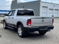 Used 2016  Ram 1500 4WD Quad Cab SLT at Paradise Motors near Lansing, MI