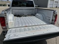 Used 2016  Ram 1500 4WD Quad Cab SLT at Paradise Motors near Lansing, MI