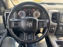 Used 2014  Ram 1500 4WD Quad Cab SLT at City Wide Auto Credit near Toledo, OH