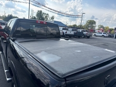 Used 2014  Ram 1500 4WD Quad Cab SLT at City Wide Auto Credit near Toledo, OH