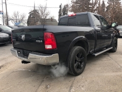 Used 2016  Ram 1500 4WD Quad Cab SLT at City Wide Auto Credit near Toledo&comma; OH