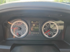 Used 2016  Ram 1500 4WD Quad Cab SLT at City Wide Auto Credit near Toledo, OH