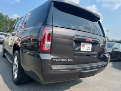 Used 2015 GMC Yukon XL 4d SUV 4WD SLT at One Stop Auto Sales near Macon, GA